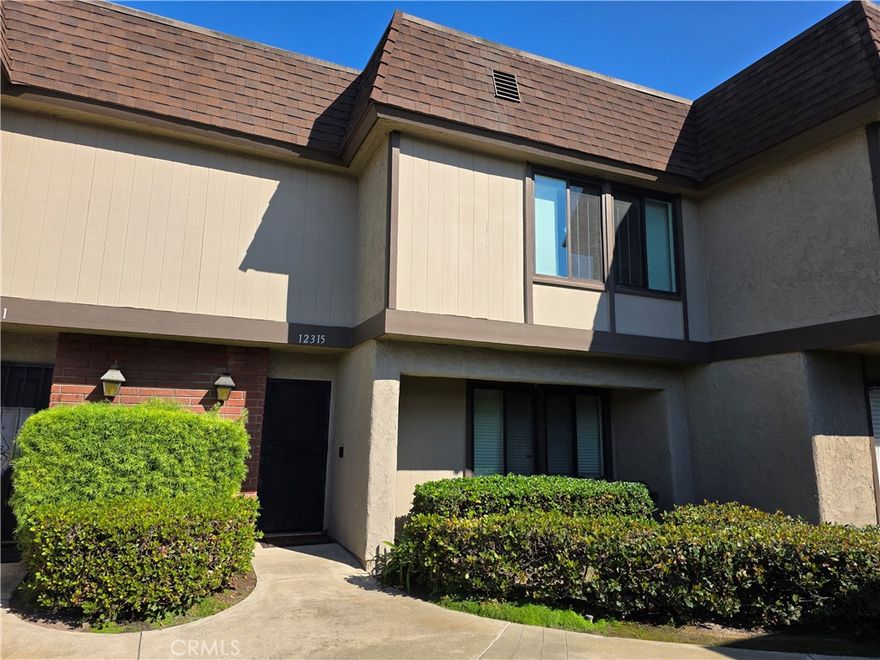 Welcome home!!! Rarely on the market! Comfort living in the elegant "Smoke tree Stanton Community", Don't miss this turnkey 1437 square feet. 3 bedrooms, 2.5 bathrooms, and large size 2 car garage town house. Situated in an excellent location near the pool and clubhouse. This home features large spacious living area. Central air conditioning and heating, Freshly painted interior, and Tile flooring throughout. Additionally featuring a Spacious kitchen with stainless steal appliances and custom wood cabinet's. separate dining area, downstairs 1/2 bath, Large Spacious primary bedroom with private bathroom. 2 more bedrooms and 1 more full bath. This home also features direct access from the garage to spacious quiet cozy covered  patio area. Great for entertaining or to sit back relax and enjoy. Smoke tree Stanton community  features many amenities pool, wading pool, Jacuzzi, club house, and beautifully landscaped greenbelt area's with lots of trees for a park like setting. Conveniently located near area restaurants, shopping center's and 22 freeway. Don't miss out on this one!