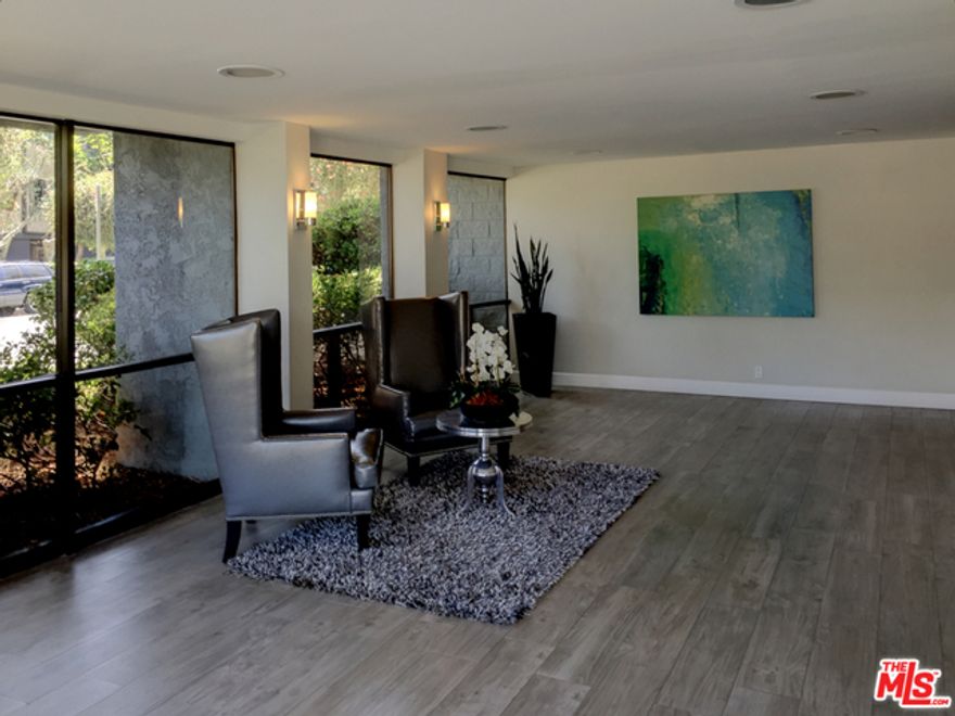 You will enjoy coming home to this quiet, beautiful, top floor unit in the very clean Del Rey Manor building just minutes from the beach. Hardwood floors, cozy fireplace, and master suite with spacious closets. Large pantry cabinet in kitchen with breakfast bar. The unit has a balcony that allows for outside morning coffees with peaceful courtyard views or relax by the pool. This Unit has 2 side by side parking spots and complex has airport soundproofing upgrades.