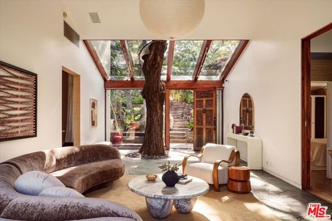 Photo of 8882 Lookout Mountain Avenue, Los Angeles, CA 90046 (MLS # 26655855)