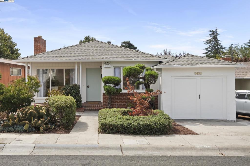 Charming and bright North Berkeley home with 2 bedrooms, 2 baths, and a versatile bonus room — ideal as a 3rd bedroom, office, or playroom. The newly remodeled kitchen and brand new roof adds modern comfort to classic character, while large windows fill the home with natural light. Outside, a spacious backyard with a bridge over a seasonal brook offers endless potential for gardening, play, or future expansion. Near North Berkeley BART and just minutes from UC Berkeley and downtown shops. This home is the perfect blend of charm and convenience!