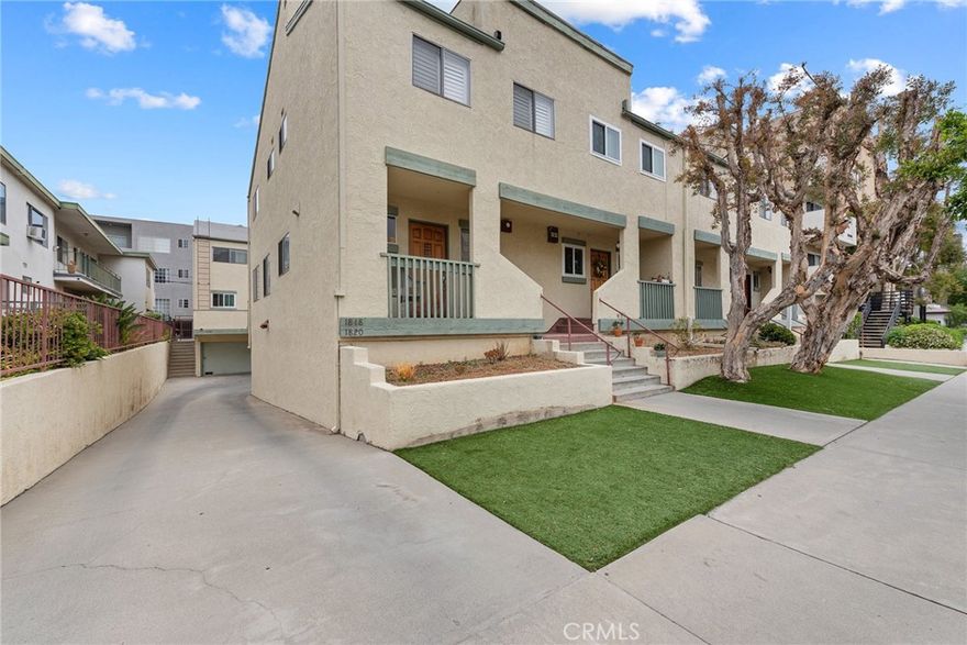 Welcome home to this beautifully updated 2-bedroom, 2.5-bath corner townhome in the heart of West LA, offering 1,180 sq ft of stylish, light-filled living space.  Front entry features half guest bathroom, coat closet, and hallway that walks into the open-concept kitchen, living, and dining area. The remodeled chef’s kitchen is a true standout that features custom white oak cabinetry, sleek quartz countertops, and a center island that adds both countertop space and seating for guests.  Appliances include KitchenAid Gas Range/Oven with downward venting, KitchenAid Dishwasher, LG Refrigerator, Samsung Microwave and nice wine fridge - ideal for entertaining and everyday living. The main floor boasts espresso-toned wood flooring and LED recessed lighting throughout. The living room also features gas fireplace and sliding glass doors that open to a spacious private balcony, perfect for BBQ'ing or relaxing. Upstairs, you’ll find two spacious bedrooms with upgraded carpet, mirrored closet doors, plantation shutters, and recessed LED lighting. Both bathrooms have been upgraded with porcelain tile flooring, white ceramic shower tile, and quartz-topped vanities.  Amenities also include attached private 2-car tandem garage with two large storage areas, LG front-loading washer/dryer, and Central AC/Heat w/ NEST Thermostat.  Unbeatable Westside location - walking distance to many restaurants, lifestyle plazas and just blocks from the vibrant Sawtelle Japantown, close to UCLA, and easy access to the 405 and 10 freeways.  Move-in ready ASAP!