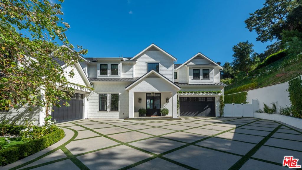 Nestled within the exclusive enclave of Prime Royal Oaks, this luxurious and spacious custom-built gated compound stands as a testament to high-end living, exuding an aura of privacy and security. The architectural design is a harmonious blend of classic brick and shingle traditional and transitional accents, seamlessly uniting timeless charm with modern sophistication and amenities. With an expansive size of approximately 8,700 square feet, the residence offers abundant space for various living areas.This remarkable home boasts 7 bedrooms and 10 bathrooms, each bedroom en-suite, ensuring maximum comfort and privacy for all residents and guests. The primary suite is a serene sanctuary with a sitting room, dual closets, and a spa-like bathroom, offering the ultimate in luxurious living. The house is not just about living space; it's a haven of entertainment and leisure. Inside, you'll also discover a theater, a bonus room, an indoor bar, and double islands in the kitchen, perfect for hosting gatherings and events.The outdoor amenities are equally impressive, including an entertainer's yard with a pool, spa, barbecue area, and even a pickleball court. It's the ideal setup for outdoor activities, relaxation, and leisurely weekends. Additionally, there is a two-story guest house with a kitchen that opens to the yard, offering a peaceful retreat and an inviting space for hosting guests.One of the two garages has been thoughtfully converted into a gym, providing a convenient space for workouts.Perched on a knoll and surrounded by mature landscaping, trees, and neighboring beautiful homes, this extremely private property promises a serene retreat. Don't miss this custom-built home which has been meticulously designed for luxury, comfort, and entertainment, making it an ideal residence for both grand gatherings and intimate occasions.
