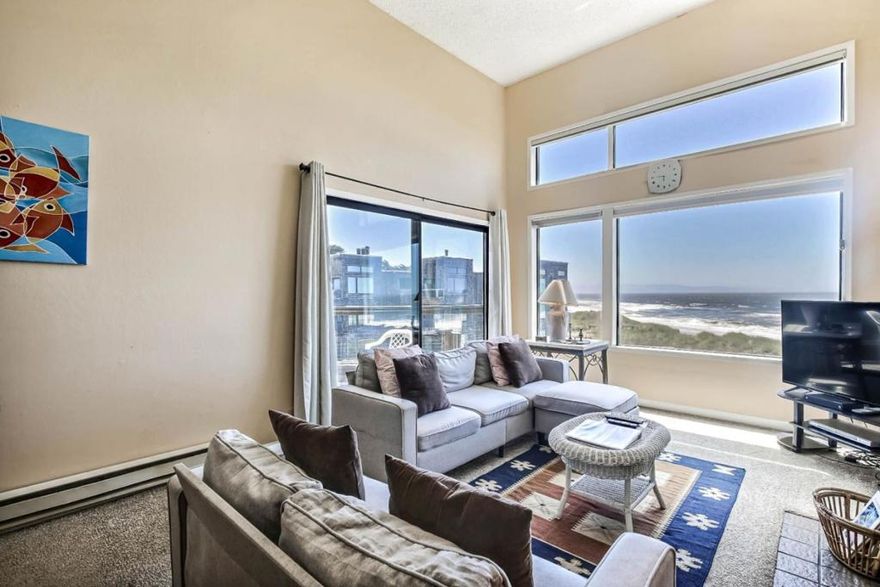 PICTURE THIS: LAYING IN BED OR RELAXING IN A COUCH IN THE LIVING ROOM AND LOOKING AT WAVES, THE BEACH, SUNSET ALL FROM YOUR HOME - ALL DAY AND ALL NIGHT LONG!! Stunning ocean views from the living room and the front bedroom.  Step on to the deck outside the living room and master bedroom -- spectacular views of the ocean and beach, you can see occasional dolphins, jumping in the water closer to sunset. What is between you and the water? Just a flight of stairs down to the private beach from your beautiful home. You can have your own bonfires on the private beach designated only to the owners.   Its a fully furnished 2 bedroom and 2 bath condo with an in unit laundry. Being on the 3rd floor gives you long and wide views of the ocean.  You must be wondering, can I/we afford this ocean-view home? The HOA allows short term rentals, you can offset your ownership costs by renting out the condo. Send photos or livestream the jaw-dropping beach and ocean views to your soon-to-be-jealous co-workers. The complex has walking trails along a small duck pond (little kids love that), you can do birdwatching, play tennis, pickleball, and basketball. Want to party and invite a large number of friends? A private party room available for the owners to reserve for guests on the property.