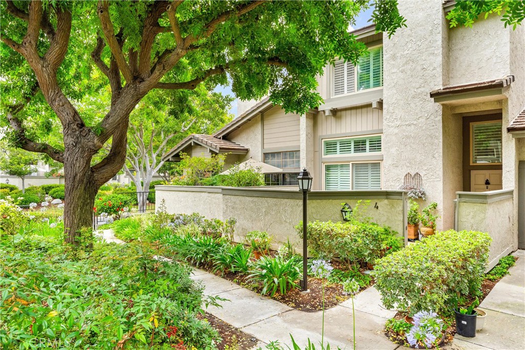 Welcome to 4 Misty Shadow –A unique opportunity in Turtle Rock to own this beautifully upgraded 2-bedroom, 2.5-bath home. This residence has thoughtfully been maintained with numerous upgrades offering the perfect blend of timeless elegance and modern comfort. From the moment you enter through the private courtyard and step inside, one is welcomed to find soaring ceilings, rich hardwood flooring, double-glazed tinted windows with plantation shutters throughout this home. The spacious open concept living and dining seamlessly connects to the courtyard, creating an ideal atmosphere for indoor-outdoor living. The remodeled kitchen is designed for both function and style, featuring custom soft-close custom cabinetry, granite countertops, an expansive breakfast bar, recessed lighting, with stainless-steel appliances, and a private balcony. From the open kitchen is the adjoining flex room/den offering a versatile layout to suit your needs. Upstairs, two spacious primary suites, each with upgraded en-suite bathrooms: The first suite showcases vaulted ceilings, a walk-in closet, and a fully remodeled bathroom showcasing granite dual vanities, a custom walk-in shower, modern bidet and timeless finishes. The second suite overlooks the tranquil tree-lined footpath, with extra storage behind sliding mirrored closets, with ensuite bathroom with a skylight that fills the room with natural light, shower-tub combo, full vanity with wall-to-wall cabinets and modern bidet. Additional features include a direct-access two-car garage equipped with washer and dryer, built-in shelving, and a custom storage pantry. A newer HVAC system ensures efficient comfort year-round. Residents enjoy access to resort-style amenities including two community sparkling pools, expansive greenbelts, nearby tennis courts and Turtle Rock Community Park. With proximity to award-winning schools, UCI, John Wayne Airport, world-class shopping, golf courses, beaches, fine dining, and outdoor trails, this is Southern California living at its finest—just minutes from it all. NO MELLO ROOS