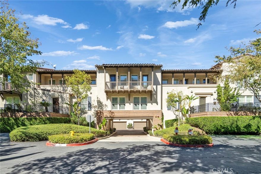 Luxury townhome shows like a model with a breath-taking panoramic city lights & mountain view. Situated in the Prestigious Diamond Bar "Vantage" Gated Community, with 2 BR+2.5BA (2 Suites), this home includes Real American Walnut Hardwood Flooring throughout the entire first floor and Master Bedroom, Crown molding throughout entire Great Room, Upgraded floorboards throughout the entire home. Custom landscaped with Flagstone, Fountain, and Automatic Sprinkler system where you can enjoy the view. The Gourmet Kitchen includes Premium Granite Counters & Island with Granite Custom Back Splash running up to upper cabinets. Large Master Bedroom includes a Spacious Balcony Overlooking the View and a Walk-In Closet. Powder room downstairs includes a marble sink, the office alcove has a built-in office desk and upper cabinets, the Spacious Laundry room also includes Built-in Cabinets. There is direct access to the 2-car attached garage and the Assoc: Resort-style amenities include a fireplace in the courtyard, a clubhouse, a swimming pool, a built-in BBQ area, a lounging space, and a private, park-like setting with bench areas—plus ample visitor parking. This home is literally within walking distance to Target, Starbucks, and a variety of restaurants. It’s also conveniently located with easy access to the 60 and 57 freeways and major shopping centers. Nearby colleges include Cal Poly Pomona. Downtown Los Angeles is just 25 minutes away. Come see this beautiful home in the highly desirable Vantage community.