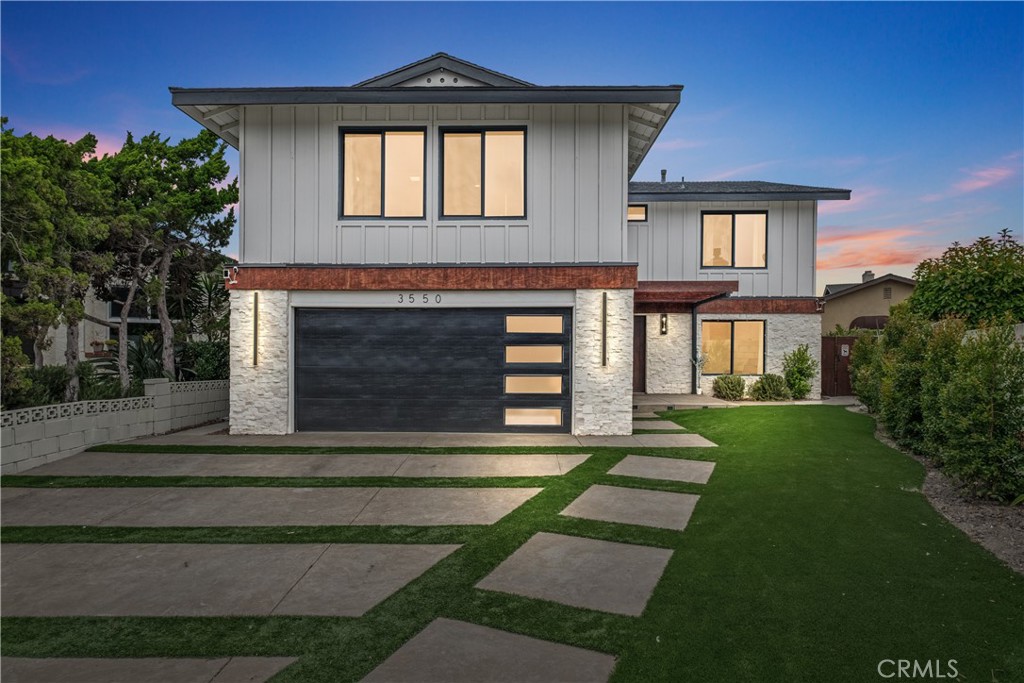 Nestled in the coveted College Park East neighborhood, this fully renovated 5 bedroom, 3.5 bathroom home offers a harmonious blend of contemporary design and coastal charm. Spanning nearly 2,800 sq. ft. on an oversized 6,050 sq. ft. lot, this stunning residence is a testament to meticulous craftsmanship and thoughtful upgrades.
Step inside to discover a bright, open floor plan with high-end waterproof laminate flooring, dual pane windows, recessed lighting, and updated plumbing throughout. Nest smart home operated central heating and air conditioning will keep you comfortable regardless of the season. The open floor plan and custom wet bar with built-in refrigerator make this home ideal for entertaining.
The gourmet kitchen is a chef’s dream, featuring ZLINE Signature appliances, custom cabinetry, quartz countertops, and a breakfast bar with a pass-through window to the backyard. Enjoy Southern California’s indoor-outdoor lifestyle with bifold doors that open to a resort-style backyard, complete with a refinished pool, hot tub, oversized patio, artificial turf, and low-maintenance landscaping.
Unique to this property are the dual primary suites. The luxurious main suite features a cozy fireplace, walk-in closet, and a spa-like en-suite bath with a dual waterfall shower, soaking tub, and double vanity. Working from home is a breeze with a built-in desk and the potential to turn one of the five bedrooms into a home office. The garage has also been upgraded with epoxy flooring and bonus overhead storage, plus a hot water heater that was just replaced in 2024.
Convenience is paramount, with an ideal location near Old Ranch Country Club, Seal Beach Tennis & Pickleball Center, and two neighborhood parks with tennis, basketball courts, sports fields, and tot lots. Despite its freeway proximity, the home remains impressively quiet indoors thanks to new dual-pane windows and a well-thought-out design. Extensively renovated for modern living and close to the region's iconic beaches and lifestyle amenities, this Seal Beach home provides the quintessential California seaside lifestyle.