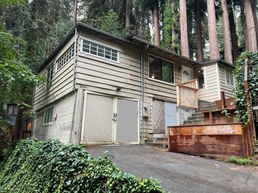Rustic mountain cabin just minutes to Silicon Valley! This charming home has been thoughtfully upgraded with laminate wood flooring, propane forced-air heating, tankless water heater, stainless steel range and refrigerator, plus a radiant heated bathroom floor. Enjoy cozy winter evenings by the wood stove and sunny afternoons on the deck. An extra room off the living area can serve as a small bedroom, office, or hobby space.  The home also features a garage with workshop/storage space underneath. Located in the welcoming Chemeketa Park community, youll have access to a playground and clubhouse just down the road. Perfect as a starter home, a downsizing opportunity, or an income-producing rental demand in this area is strong! The Park has their own water company and maintains the private roads.  It is not a HOA.  Dues, including water, are approximately $200 month.