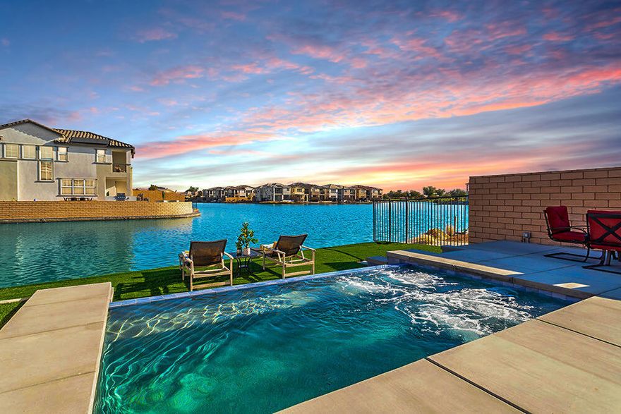 A Rare Lakefront Luxury Estate -- Where Elegance Meets Exclusivity. Discover a residence that transcends luxury living. This custom-designed, lakefront masterpiece is one of the very few fully detached homes on the water, offering unmatched privacy, exclusivity, and enduring value. From the moment you arrive, the architectural refinement, polished finishes, and tranquil setting create an atmosphere of true distinction.The main level welcomes you with an opulent primary suite, thoughtfully designed for comfort and serenity. A spacious two-car garage and a beautifully appointed half bath complete the first-floor layout with both convenience and sophistication. Ascending the graceful staircase, you'll find three additional master-style bedrooms, each offering its own private retreat. An expansive loft anchors the upper level -- ideal for elevated living, entertaining, or simply unwinding in style. The primary master suite is a sanctuary of indulgence, featuring a generous walk-in closet, a spa-inspired en-suite, and a private balcony that captures panoramic lake and mountain views. Here, every sunrise and sunset becomes a moment to savor. Beyond its elegance, this estate offers remarkable investment versatility. With no short-term rental restrictions, the property is perfectly positioned for high-demand luxury stays through Airbnb, VRBO, or private retreat bookings. Its location is exceptional -- minutes from world-class golf, tennis, equestrian facilities, premier soccer events, and the iconic Coachella Valley Music & Arts Festival. Whether you seek a private luxury residence, an income-producing investment, or a lifestyle retreat to enjoy and share, this lakefront jewel delivers prestige, performance, and timeless appeal.