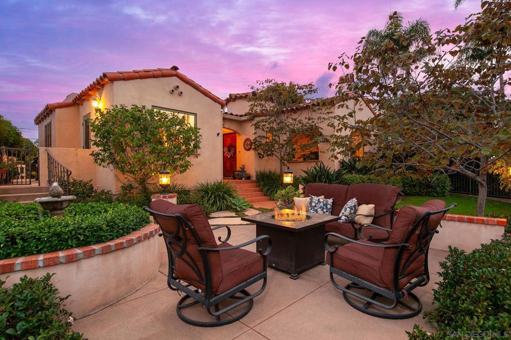 Step into the charm and elegance of this beautifully maintained Spanish-style single-story home, perfectly situated in the coveted Plumosa Park neighborhood. Built in 1934 and brimming with original character, this 3-bedroom, 3-bathroom home offers approximately 2,219 square feet of inviting living space on a generous 6,000 square foot lot. Gated entry will great you as you enter into the front courtyard with a lush private yard, elevated patio with sit down views of Downtown and a fountain. From the moment you walk up to the covered front porch you’ll be captivated by the home’s warm curb appeal, lush, meticulously landscaped gardens, and classic Spanish architectural details. Inside, arched doorways, natural light, and timeless finishes create a welcoming atmosphere, while an extra bonus room offers flexibility for a home office, studio, or guest space. Out back, escape to your own private oasis—complete with a relaxing hot tub, vibrant landscaping, and plenty of space for entertaining or quiet evening retreats under the stars. The 2-car garage with a dutch door entry from the back yard, adds convenience and storage to this already incredible home. Located in one of Point Loma’s most desirable neighborhoods, you’ll enjoy a strong sense of community, walkable streets, and close proximity to beaches, shopping, dining, and top schools. This is more than just a home—it’s a rare opportunity to own a lovingly preserved slice of historic San Diego charm. Come see it for yourself!