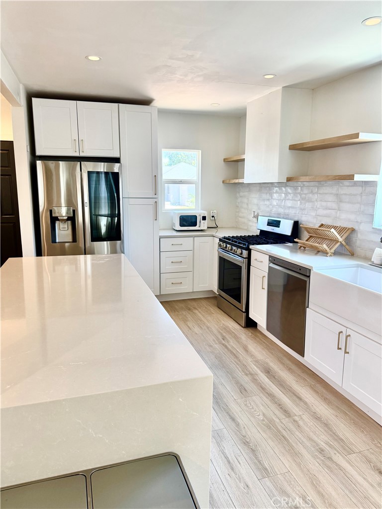 WOW THIS IS A BEAUTY. A BIT OF HEAVEN HERE ON EARTH. THIS 4 BEDROOM 2 BATH HOME IS EXQUISITELY DESIGNED WITH LOVE! LOCATED IN TORRANCE FOR TORRANCE SCHOOLS. CONVIENTLLY LOCATED TO SCHOOLS SHOPPING FFWYS. HOME IS EQUIPPED WITH TOP OF THE LINE WATER FILTRATIONS SYSTEM. THIS. HOME AS HAS SO MUCH TO OFFER.