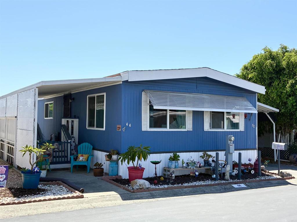 Cute home with large yard and NO property taxes! The spacious yard has been fully fenced and upgraded with turf, plus two newer Rubbermaid sheds and a raised garden planter box. Spend time outdoors on the back patio or raised covered porch. The interior boasts many recent upgrades within the last 2-3 years including most windows having been upgraded, new water heater, refrigerator, and disposal. Other upgrades done by previous owner include: Newer counters in the Kitchen & Bathroom and a Newer furnace! Walk in closet. Stackable washer and dryer convey along with the refrigerator and stove/oven. Walking distance to Sprouts, Albertsons, Rite Aid, dining & shopping, near Downtown Vista; breweries, movie theater, transportation, Moonlight Amphitheater & a short drive to beaches!