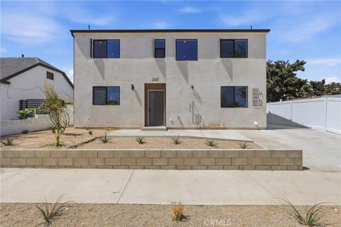 Photo of 1507 W 83rd Street, Los Angeles, CA 90047 (MLS # SB26177623)