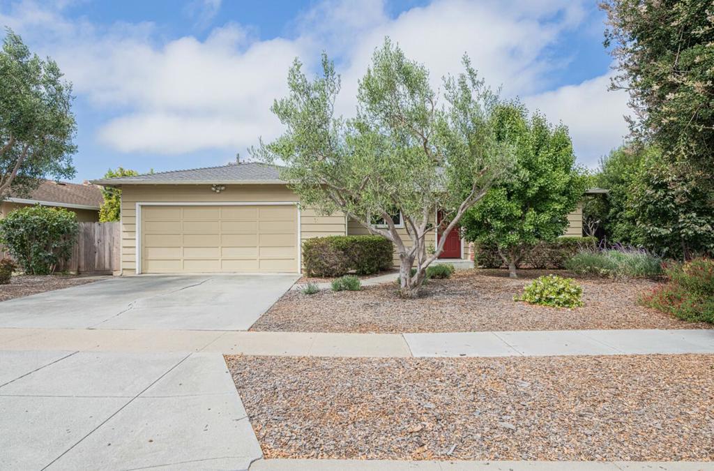 Tucked into the heart of Pacific Park, this 3-bed, 2-bath home has been refined over time and offers timeless curb appeal with a warm, inviting interior. A sunlit living room welcomes you with a wood-burning fireplace and picture window, flowing seamlessly into a kitchen featuring quartz counters, maple cabinets, and stainless appliances. Beautiful oak hardwood flooring runs throughout, adding richness and character. Features include double-pane windows and leased solar for energy efficiency. The fully fenced backyard offers a private space to relax or entertain, complete with a back deck and raised garden beds. A 2-car garage, wide driveway, and thoughtful layout complete this comfortable South Salinas home. Close to shopping, schools, and parkscomfort, style, and location all in one.