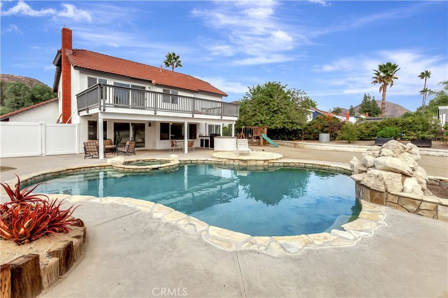 Welcome home to this fully remodeled retreat in Wildomar, where comfort and California living come together. Sitting on a generous 20,000-square-foot lot with low taxes and no HOA, this home was designed for easy living and effortless entertaining. The open-concept layout connects a beautifully updated kitchen to the family room with a cozy fireplace, creating a warm and inviting space to gather. Step outside to enjoy a sparkling pool and spa, built-in barbecue, and a large open yard ready for whatever life brings — from entertaining to expanding. The property also features a dedicated chicken coop area, raised vegetable beds for growing your own food, and plenty of extra space alongside the driveway for boat or recreational parking. With newly remodeled kitchen, three updated bathrooms, new LVP floors, and newer systems including HVAC, water heater, and windows, this home offers modern comfort, thoughtful upgrades, and pride of ownership throughout.