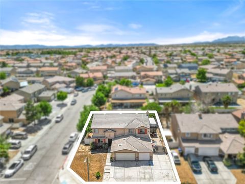 Photo of 12419 Ojo Caliente St, Victorville, CA 92392 (MLS # CV26149449)