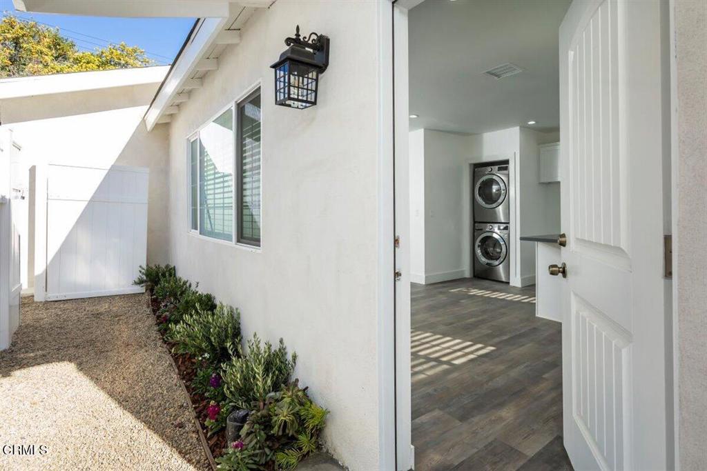 Located in the heart of Van Nuys, moments from Valley Village and North Hollywood, this entirely remodeled two-bedroom home showcases light, bright interiors. Situated in the rear of the lot, fully fenced, private and part of a duplex. New kitchen offers custom cabinets, quarts countertops and stainless steel appliances, while the home features include new floors, windows, new bathroom and full-size washer and dryer. Interior opens to a private, quaint and gated backyard with fruit trees and space to relax or play. Moments from shopping, dining and the studios of Noho and Valley Village.