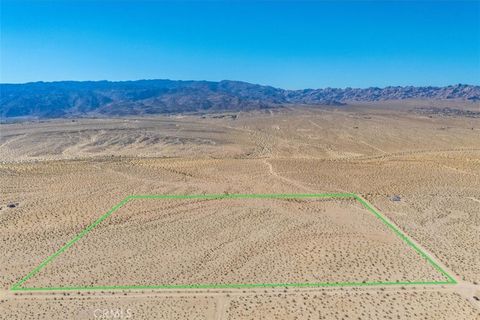 Photo of 70147 Cove View Road, 29 Palms, CA 92277 (MLS # JT26043046)