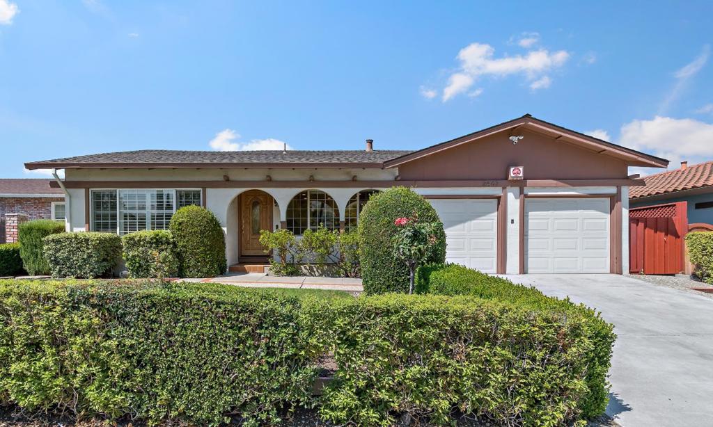 Spacious, light and bright describes this well maintained home. Wood floors are featured through most of the home with a wood look laminate in the family room and kitchen. The eat in kitchen has been thoughtfully updated with quartz counter tops, breakfast bar, built in ovens and gas range top and has direct access to the attached garage. Bathrooms have granite countertops and tile tub and/or shower surrounds. 3 bedrooms have ceiling fans and the 4th bedroom is set up as an office. The formal living room has a large front window with a view to the neighborhood. Formal dining room has a built in cabinet for storage and has ample room for large dinner parties. The family room has a fireplace and provides direct access to the back yard and patio. The front yard is surrounded by mature box hedges and the backyard is fully fenced. The two can garage has attic storage, water heater, heating system and the washer and dryer. Centrally located to shopping, schools, major expressways and highways.