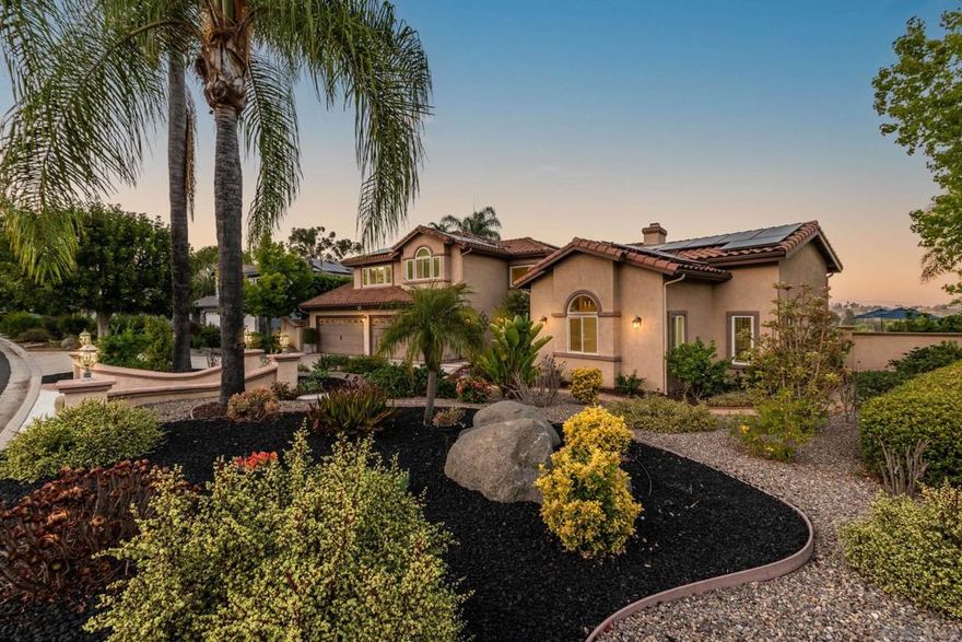 Stunning Upgrades and Spectacular Views! From the moment you step inside, you'll notice the impressive custom renovations throughout this expansive home with over 5 bedrooms—including two primary suites, one of which is downstairs with serene views of the pool and mountains. The kitchen, fully remodeled in 2015, features high-end Bosch appliances (convection hood, range, microwave, and oven), modern recessed/pendant lighting and a spacious redesigned layout centered around a large island w/ seating.  The breakfast nook boasts a custom built-in bench with hidden storage. Bedrooms are generously sized, and all bathrooms have been beautifully updated. The home includes copper plumbing, energy-efficient Low-E vinyl windows and sliders, and a striking wrought iron staircase. An oversized 4-car garage complements the 13.6 kW solar system that powers the entire home, including an EV charger. The tiered backyard is an entertainer’s dream—featuring a retiled pool and spa with separate solar heating, an outdoor kitchen, firepit, basketball court, motorized awning, and fruit trees—all set against a backdrop of breathtaking views. Additional highlights include an upgraded security system and a drought-tolerant front yard. Every detail of this home reflects exceptional craftsmanship and thoughtful design.