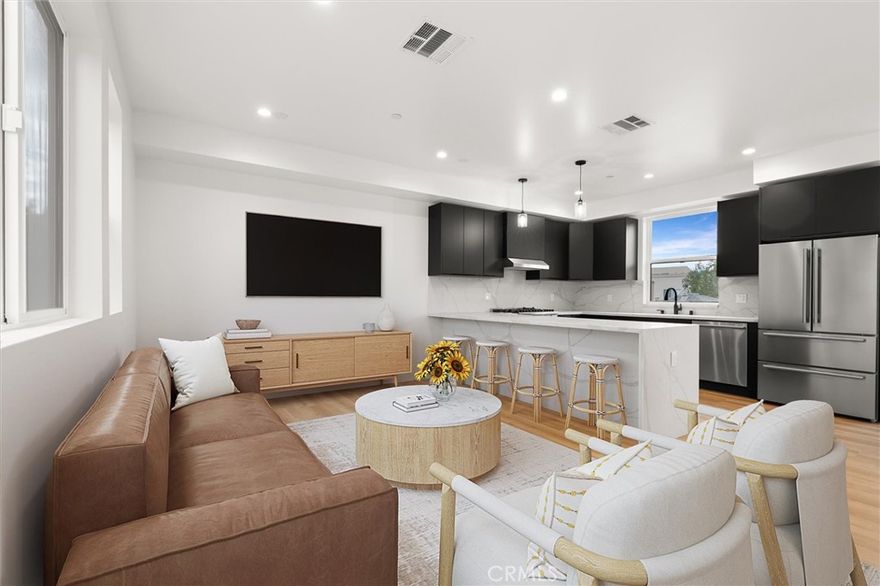 ***WELCOME TO TUJUNGA 6*** An exclusive collection of six brand new homes thoughtfully designed to help you live in style and confidence. Nestled in the vibrant North Hollywood neighborhood, these modern residences offer breathtaking mountain views and a design that seamlessly combines comfort, elegance, and functionality—ideal for buyers ready to make a smart move.

Located just under a mile from the vibrant NoHo Arts District, you'll be close to a thriving hub of theaters, galleries, dining, and creative energy, while enjoying the serenity of a quiet, gated community. Whether you're starting fresh or upgrading, Tujunga 6 provides the perfect backdrop for your new chapter.

Inside, you’ll find spacious, open-concept living with soaring 10-foot ceilings that create a bright, airy atmosphere. The home features stunning real wood, custom-designed cabinets, quartz countertops and backsplashes, and designer tile accents that elevate every space. State-of-the-art Forno 4-piece professional appliances—including a gas range and French door refrigerator—make cooking a joy, while the full-size washer and dryer add the convenience you need. 

Enjoy the outdoors with your own private rooftop deck perfect for relaxing or entertaining friends with the BEST views in all of North Hollywood. Additional features include tankless water heater for efficient hot water, full-size two-car garages, and modern upgrades throughout. With thoughtful design elements and premium finishes, these homes offer everything you need to enjoy your homeownership journey in style.

Tujunga 6 isn’t just a place to live—it’s your gateway to new opportunities and a thriving lifestyle. Welcome home to modern comfort and North Hollywood attitude!