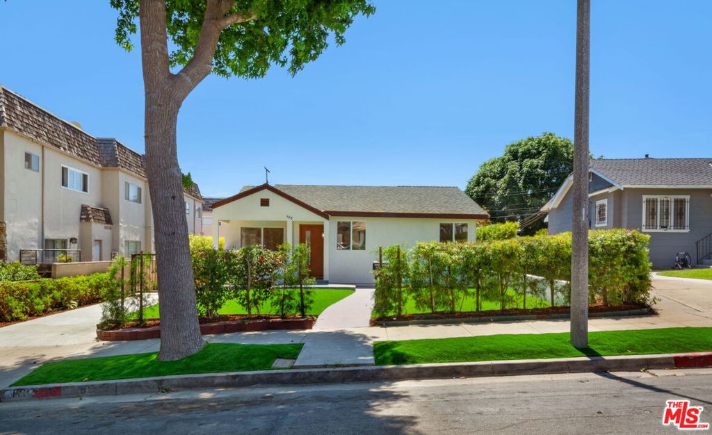 Discover a stunning dual-residence property in the heart of Inglewood, California, just moments away from the iconic Sofi Stadium and the vibrant entertainment district. This meticulously remodeled property boasts a total of nearly 2,800 square feet, featuring 3 distinct living spaces that offer modern comfort and style.The front house is a spacious three-bedroom, three-bathroom haven. Upon entering, you are greeted by an open-concept living area adorned with elegant wood flooring that flows seamlessly throughout. The custom cabinetry in the kitchen provides ample storage, while the stainless steel appliances promise a contemporary culinary experience. The thoughtfully designed layout ensures both functionality and a warm, inviting atmosphere, perfect for family gatherings and entertaining guests. Second unit is equally impressive, offering three bedrooms and two bathrooms. This space has also been fully remodeled to reflect modern aesthetics and comfort. Ideal for guests, extended family, or as a rental unit, it features the same high-quality finishes as the front house, including wood flooring and stylish cabinetry and 12ft ceilings throughout. The third unit, is a studio unit with bath and custom kitchen. The property is situated on a generous lot, providing ample outdoor space for relaxation and entertainment. Enjoy the sunny California weather in a private setting, perfect for barbecues, or simply unwinding after a long day.Located in a thriving neighborhood, this property is just a stone's throw away from Sofi Stadium AN Intuit Domer making it an excellent investment opportunity for anyone looking to capitalize on the area's growth. With easy access to local amenities, shopping, dining, and major transportation routes, this property offers the best of Inglewood living.Don't miss the chance to own this exceptional property that blends modern luxury with prime location. Schedule a viewing today!
