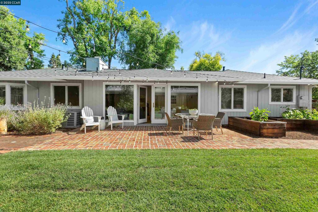 This stunning 3-bedroom, 2-bath home offers 1,600 square feet of comfortable living space in the highly sought-after Parkmead neighborhood. Walk to downtown Walnut Creek, enjoy top-rated schools, and stroll to Parkmead Elementary—this location is unbeatable! Step inside and discover a warm, inviting interior flooded with natural light. The open floor plan maximizes space while hardwood floors flow throughout the majority of the home. Custom Elfa closets provide exceptional organization, and new ceiling fans and fixtures enhance every room. The large living area creates the perfect setting for hosting family and guests. The detached backyard ADU steals the show—complete with HVAC and electricity, this versatile space transforms into a home office, gym, or art studio. The expansive yard includes lush lawn for play, garden beds for planting, and an orange tree that produces delicious oranges every winter. Market lights illuminate outdoor entertaining on warm summer evenings. This home combines charm, utility, and prime location in one exceptional Parkmead opportunity! Open Saturday and Sunday 1-4 PM!