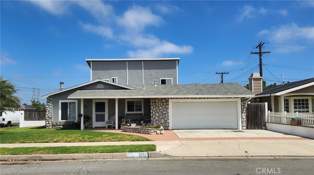 Welcome to the South Shores Tract. This Craftsman-style home is located just a short distance from the ocean and Huntington Beach Pier. Recently painted, it offers 3 bedrooms, 5 bathrooms, and 3 fireplaces with multiple living areas, including a cozy living room and a remodeled kitchen featuring a 5-burner cooktop, refrigerator, dishwasher, and built-in beverage refrigerator. Two primary suites each include ensuite bathrooms. At the rear of the home, a large addition includes a spacious 2-car garage and a renovated ADU with a bonus room, kitchen, and bathroom. The property also features a 10' x 58' driveway with room for multiple vehicles, boat, or recreational vehicle. Conveniently located near Bella Terra shopping and dining, South Coast Plaza, parks, schools, and bike trails.