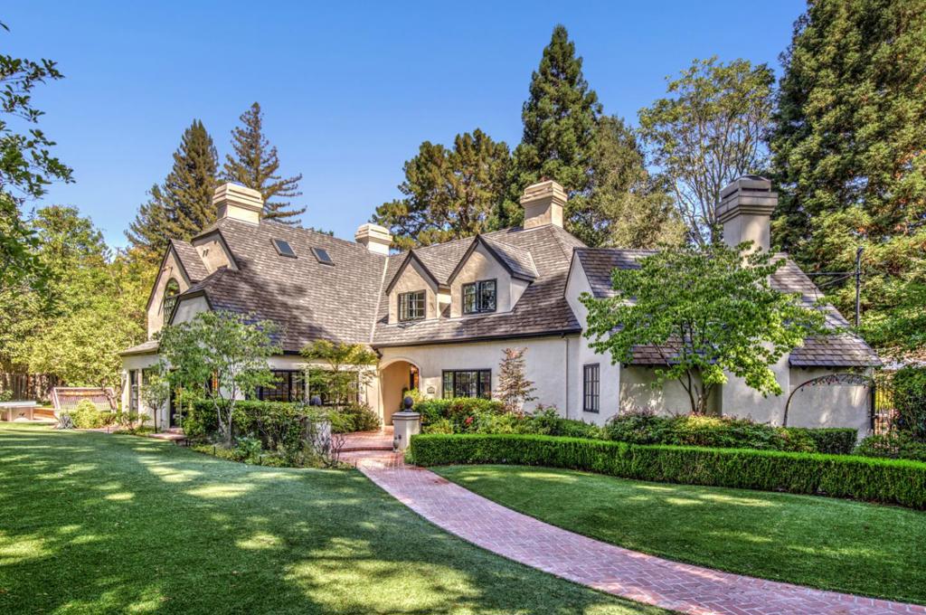 Charming English Tudor manor with stylishly updated interiors, resort-inspired grounds, and a spacious 1-bedroom, 1-bath guest house with full kitchen that doubles as poolside entertainment venue. Main level consists of kitchen & adjoining family room, library/office with outside entrance and spacious, bright, & light bedroom suite with pool access. Upstairs, three additional bedrooms include primary suite featuring customized wardrobe space & all marble luxe bath. Grounds features 8-hole putting green, large pool, fireplace terrace with bbq center, plus a 2nd bbq poolside. Located in the heart of desirable West Atherton. Minutes from Menlo Circus Club, downtown Menlo Park, & Stanford University Per Floor Plan Visuals, total square footage : 7,365 sq. ft. Main House: 4,670 sq. ft., Guest House: 960 sq. ft., Main House Attic Storage Upper Level: 30 sq. ft., Main Residence Basement: 230 sq. ft., Guest House Mech Room: 50 sq. ft., Detached 3-car garage: 995 sq. ft., and Sheds: 430 sq.ft.