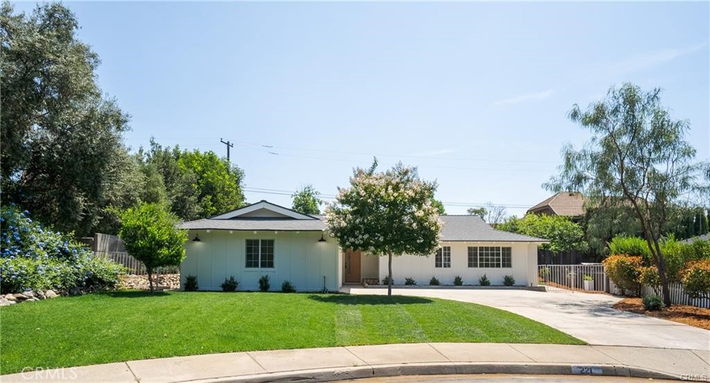 This beautifully upgraded home sits at the end of a cul-de-sac in North Claremont, just North of the 210 freeway. Everything is fresh, new, and ready for you to move right in and start enjoying the Claremont lifestyle. A spacious entryway immediately welcomes you into the home, leading to an over-sized family room which is centered around a lovely fireplace with solid wood mantle. Moving through to the dining and kitchen area, there is plenty of room for large dining table- perfect for entertaining. The kitchen is all brand new, with quartz counters, oak cabinetry, brand new appliances, and a plethora of storage. Here you'll also find direct access to your attached 2-car garage. New waterproof vinyl flooring flows throughout the home, in an airy light oak color. Down the hall, you'll find the first bathroom, with dual sinks, oak vanity, and a cheerful tile color scheme. The secondary bedrooms are both a great size. At the end of the hall in the primary suite, you'll enjoy the convenience of dual sinks, an oak vanity, quartz counters, and not one, but two closets! The freshly tiled shower has a spa-like aesthetic, with a neutral palette, pebbled floor, and gorgeous new glass shower surround. The upgrades don't end inside the home, the exterior is freshly painted and new landscaping is in place. Enjoy the outdoors, with the La Puerta Sports park, Higginbotham Park, and the Sycamore Canyon Hiking Trailhead all located less than a mile from your front door; Or, head straight down Indian Hill Boulevard to the heart of the Claremont Village to experience all the dining and special events that make Claremont such a special place to call home.