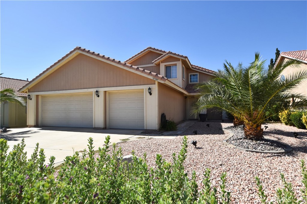 COMMUTER-FRIENDLY & MOVE-IN READY!
Welcome to this spacious and well-maintained 4-bedroom, 3-bathroom home located in Victorville. Offering 2,199 sq ft of comfortable living space, this property is perfect for families of all sizes.
Step inside to find extensive custom tile flooring throughout, a warm and inviting family room with a cozy fireplace, and a versatile layout designed for everyday living and entertaining. The large upstairs primary suite features his-and-hers closets and is situated near two additional bedrooms connected by a convenient Jack-and-Jill bathroom. A downstairs bedroom adds flexibility—perfect for guests, a home office, or multigenerational living.
The beautifully landscaped backyard includes a large covered patio, fruit-bearing trees, and extra concrete work—ideal for relaxing or hosting gatherings. A spacious 3-car garage provides ample parking and storage.
Location, location, location! This home is just minutes from the 15 Freeway, making commuting a breeze. You’ll also enjoy being close to the Victor Valley Mall, popular retail stores, dining options, and more.