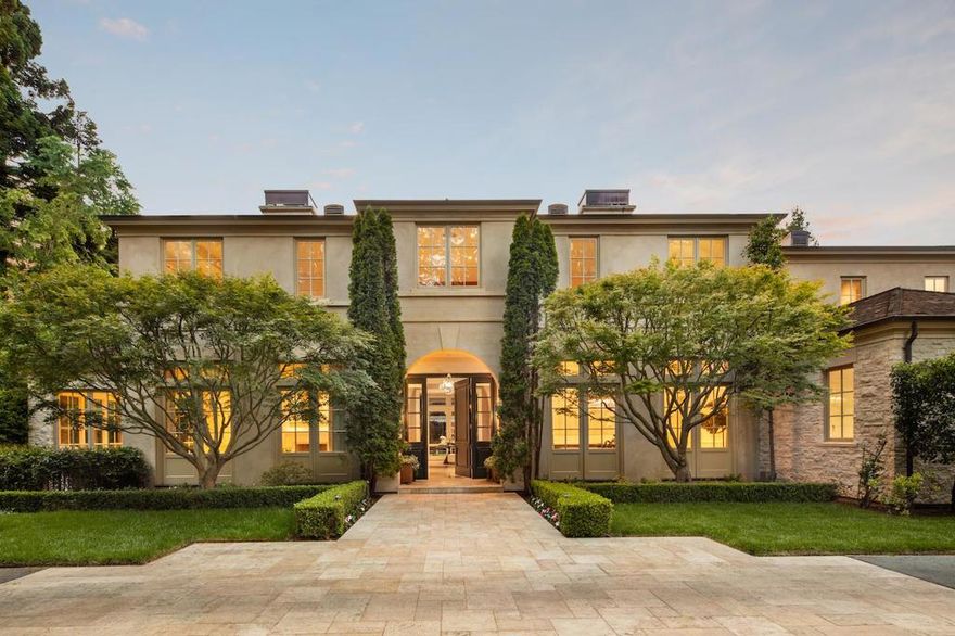 Luxurious estate on 1+ acre built by Pacific Peninsula Group. 3-level masterpiece has exquisite details, rift-sawn white oak floors, and an array of marble and natural stone finishes. Spacious formal rooms, stunning gourmet kitchen and adjoining family room opening to a fireplace loggia. Library, 6-bedrooms one presently used as an office. Lower-level recreation room, customized wine cellar, theater, and fitness center. 1-bedroom guest house with kitchen. Beautifully landscaped grounds with separately fenced pool and spa, outdoor shower & plunge tub, loggia with barbecue center, custom playground, vegetable garden & fruit trees. In the heart of central Atherton, #1 ZIP code in the US, near Stanford, Silicon Valley tech centers, Sand Hill Road, and 2 international airports.