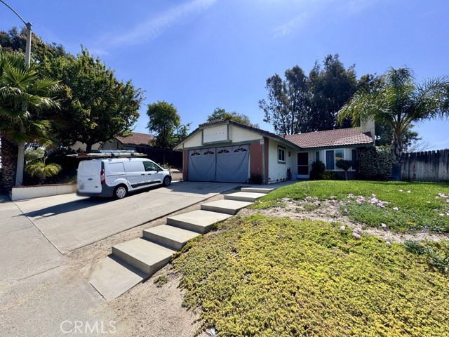 Welcome Home! This charming 3 bedroom, 2 bathroom single-story home is located on a desirable corner lot in Temecula and is coming soon for lease! Offering over 1,260 sq. ft. of living space, a 2 car garage, and a spacious backyard, this home provides both comfort and functionality. As you enter inside, you’re welcomed by a bright living room filled with natural light and centered around a cozy fireplace. Just off the living room, the kitchen and dining area offer a great space for entertaining. The kitchen features seafoam green cabinets, tile countertops, tile backsplash, stainless steel appliances, track lighting, a skylight, breakfast bar, and opwns to the dining room/family room which include French doors that lead out to the backyard. Down the hallway, you'll find all three bedrooms and both bathrooms. The hallway bath includes an upgraded vanity and a shower/tub combo. Each bedroom is generously sized. The primary bedroom features an oversized closet, a sliding glass door to the backyard, and an en suite bathroom with dual sinks and a shower/tub combo. Outside, enjoy a large backyard and side yard, perfect for relaxing or entertaining. This home is located in very close promiximity to award winning schools, parks, Temecula promenade mall, freeway access and much more. Showings begin July 1st, join the waitlist today!