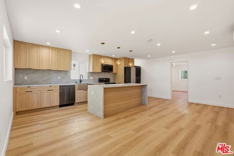 Photo of 1132 1/2 S Wooster Street, Los Angeles, CA 90035 (MLS # 26101625)