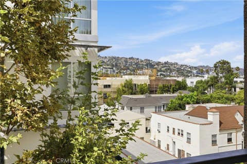 Photo of 450 N Palm Dr DR #407, Beverly Hills, CA 90210 (MLS # SR26180001)