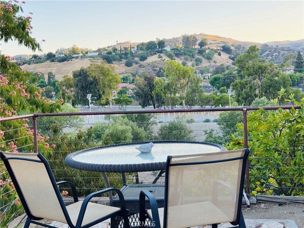 Welcome to this single-story, breathtaking panoramic view of the Valley and Castle Peak Mountain home in the heart of the West Hills! Gated, bright & light, open floor plan! Elegant, spacious living room, formal dining room open to the kitchen, perfect for entertaining. Sliding glass doors provide endless spectacular views from the spacious master bedroom, formal dining, and kitchen areas! Located in EL CAMINO, HALE, POMELO SCHOOL DISTRICT! Minutes from The Village, Calabasas Commons, top dining, shopping, and entertainment, MAGNIFICENT SUNSET AND SUNRISE BACK-YARD. This home truly has it all. Make this beautiful home your sweet home!