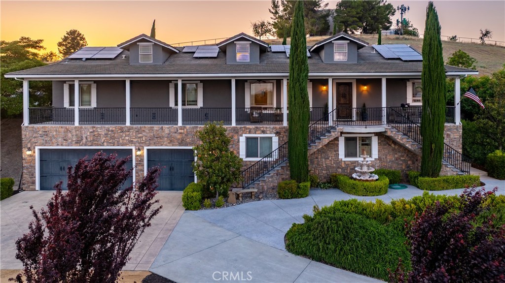 Bellissimo! Custom, Executive Home in the Paso Robles wine country, gives an architectural nod to the picturesque homes of the Tuscany region of Italy. The dual staircases introduce you to the tiled grand veranda that spans the entire length of the home. With a spectacular view of the oak studded hills, all the way to the Santa Lucia Mountain Range miles away. Step into 2900 square feet, 4 bedrooms, 3 baths of spacious beauty. The feel of old-world craftmanship with a modern narrative.
Walk on the hand selected Travertine tile floors throughout the greater portion of the interior. Enjoy the well plotted cucina/kitchen, with its spectacular granite counter tops, stone tile backsplash, breakfast bar, walk-in pantry and custom cabinetry. This would be the envy of any top chef - from any country. You cook - perhaps a gourmet, Napoli style meal while your friends, family and guests visit with you from the open style Great Room/Family Room. The dinner bell beckons them to the formal dining room. Just across the hall is the office/parlor/library/tv room waiting for your imagination. Notice the hallway, which the builder borrowed the arched design ceiling, used in Roman architecture. Just enough style to make you aware that consideration and planning went into every inch this beautiful home. The backyard, with its serene fountain, pergola and low maintenance landscaping, comes with raised garden beds & hen house for your fresh eggs and a grassy side yard maybe fun for Boccie Ball. RV Parking, Solar, Oversize 3-4 car garage with a shop area and large storage room. All on 2.10 acres.
In Templeton or Paso Robles School Districts. Close to shopping, restaurants at the Gateway to world renown wineries.
