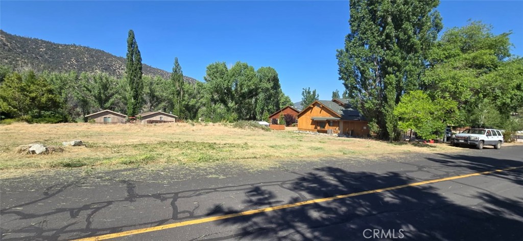 Nestled in an idyllic location, this flat lot offers just under 1/4 of an acre, boasting stunning Mountain Views and endless possibilities. With water and power conveniently located at the street, along with an individual water meter already in place, the property is primed for your vision—whether that includes building your dream home or simply enjoying the amenities without constructing.
Situated within walking distance of the clubhouse and local amenities, this property provides access to an impressive array of community features. Indulge in resort-style living with a sparkling pool, relaxing hot tub, tennis courts, a well-maintained golf course, a serene lake, and more—all within easy reach. Whether you’re seeking relaxation or recreation, this community has it covered.
For those desiring additional space, the adjacent lot is available for purchase, giving you the rare opportunity to expand your holdings to nearly 1/2 acre. This is a fantastic opportunity to create a retreat perfectly tailored to your needs.