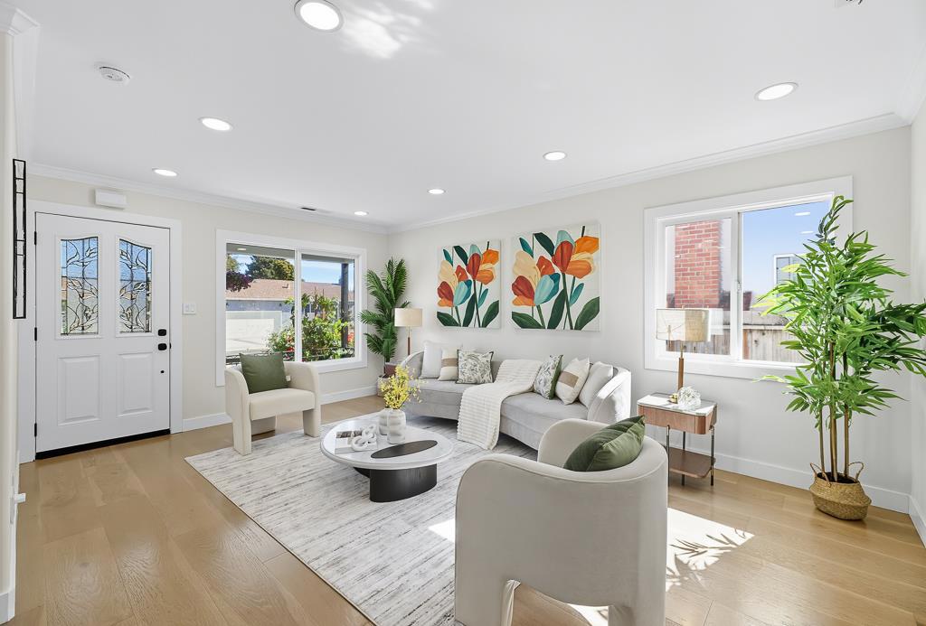 Own TWO Homes for the Price of ONE! Meticulously maintained by the owner with numerous custom upgrades, this beautifully renovated single-level home features a 3BR/2BA main home plus a 2-year-old 2BR/2BA ADU, totaling 1,874 sq. ft. of living space. The main home showcases brand-new bathrooms with designer fixtures and premium cabinets, a modern kitchen with new cabinets, sink, countertops and high-end appliances, new interior doors, engineered wood flooring, updated lighting, and a finished 2-car garage with epoxy floors. Landscaping includes new plants and low-maintenance turf for curb appeal. The ADU impresses with soaring 9-foot ceilings, excellent natural light, full kitchen and baths with floor-to-ceiling tiles, custom cabinetry, solid wood doors, insulated walls with soundproofing in the primary bedroom, and a spacious laundry room with easy potential to add a half bath. With a total of 5BR/4BA across two units, this flexible design is ideal for multi-generational living, rental income, or enjoying one home while leasing the other. Conveniently located near Meta, Tesla, Seagate, Lucid, and Logitech, with easy access to Dumbarton Bridge and I-880, plus Costco, Safeway, and FoodMaxx nearby.