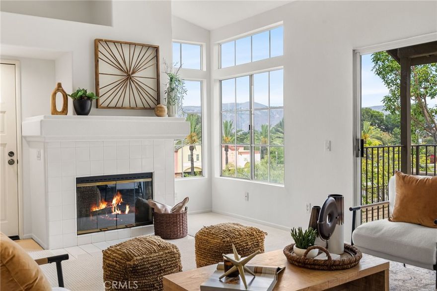 Welcome to 8123 E. Oak Ridge Circle, a beautifully upgraded 2-bedroom, 2-bathroom end unit condo nestled in the highly sought-after Laurelwood community of Anaheim Hills. This thoughtfully designed home offers the ease and flow of single-level living — with all main rooms on one floor — while providing an elevated entry that enhances privacy and 180 degree views. Designed for comfort and style, this move-in ready home offers the perfect balance of modern updates, effortless living, and a serene neighborhood setting. Step inside to discover a bright, open-concept living area filled with natural light and warmth. The spacious floor plan flows seamlessly from the inviting living room into the dining area and refreshed kitchen, complete with brand-new luxury vinyl tile flooring. Every detail has been thoughtfully refreshed — from the fresh paint and plush new carpet to the newer AC unit that enhances the home’s clean, contemporary vibe. The primary bathroom has been tastefully remodeled with sleek, modern finishes, creating a spa-inspired experience you’ll love coming home to. Step outside to your private patio, perfect for morning coffee, evening gatherings, or simply enjoying the peaceful Southern California weather. This home also features an attached two-car garage with ample storage, plus access to the community pools and spas — all surrounded by beautifully maintained green spaces that embody Anaheim Hills’ natural charm. Located near top-rated schools, scenic parks, shopping, and commuter routes, this home offers both serenity and convenience in one of Orange County’s most desirable areas. You’ll also enjoy being just moments from local favorites like Rosine’s Mediterranean Restaurant and Sunbliss Café, both beloved Anaheim Hills icons. Whether you’re a first-time buyer, downsizing, or looking for a low-maintenance investment, 8123 E. Oak Ridge Circle is the perfect place to call home — a rare find that combines style, comfort, and location in one beautiful package.