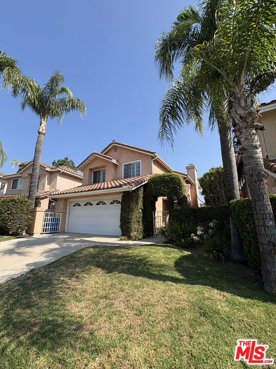 This home is located in the prestigious guard gated Calabasas Hills Estates. The assigned elementary school is Bay Laurel Elementary. The home offers 3 bedrooms and 2.5 baths. Enjoy a formal living room with high ceilings and a stone fireplace. The family room with a built-in media cabinet is adjacent to the kitchen with granite counters, stainless steel appliances, and a breakfast area. The backyard has a built in BBQ with canyon views. The community is guard gated with two community pools and a private community park.