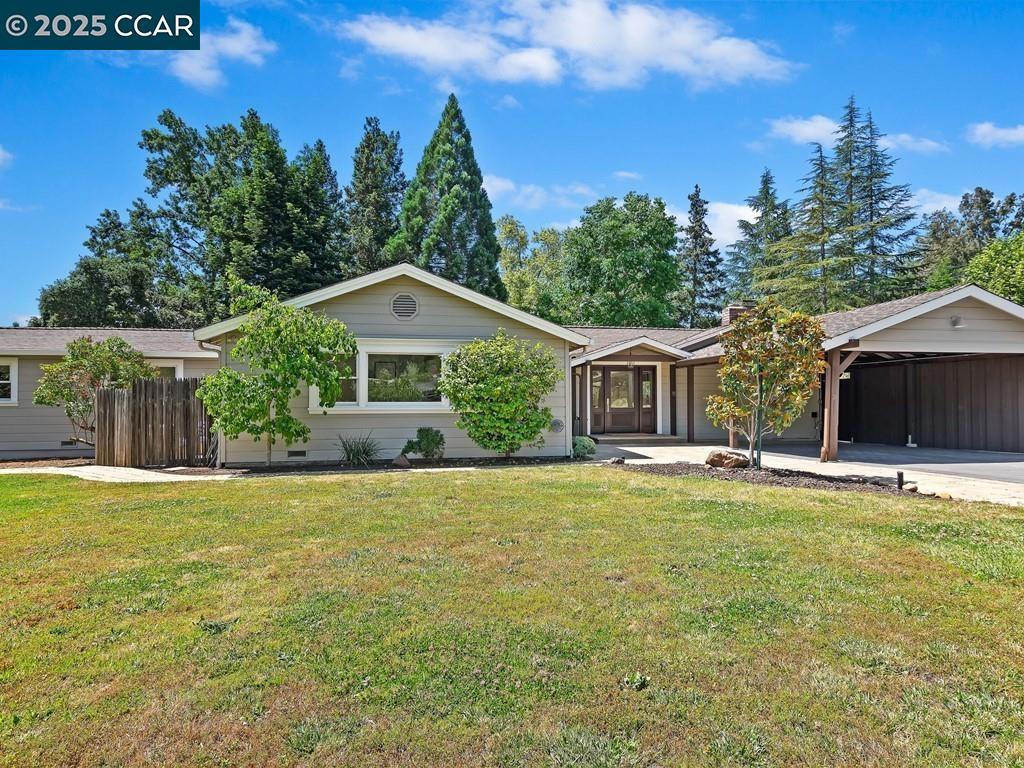 Happy Valley Country Retreat. Filled with warmth & characteristic charm, this single level ranch style home enjoys a large, level parcel in a premium location. Exceptional outdoor spaces bring a serene natural setting with gardens, a huge lawn, multiple paver patios & mature landscaping with a variety of fruit trees. A separate 340± sq ft guest house with full bath adds flexibility—ideal for guests, a home office, or creative studio (currently not heated). The home exudes comfort and quality. Renovated throughout, it features Andersen wood-framed windows & glass doors, stylish lighting & hardware, thoughtfully updates. Glass doors in each living space provide seamless indoor/outdoor living, with access to special outdoor spaces off of each room. Oak hardwood & stone floors run throughout the spacious, light-filled living areas. The primary suite is a peaceful retreat with a walk-in closet & a sliding glass door opening to the garden. Mature gardens & trees include fig, pear, apple, persimmon, olive, citrus, dogwood, sycamore, hydrangea, jade, raised vegetable bed & rose garden. Top location in desirable Happy Valley. Walking path makes a 5 mi loop & offers walking/biking access to Happy Valley Elementary (1.1 mi) & vibrant downtown. Highly acclaimed schools, Hwy 24 & Bart nearby.