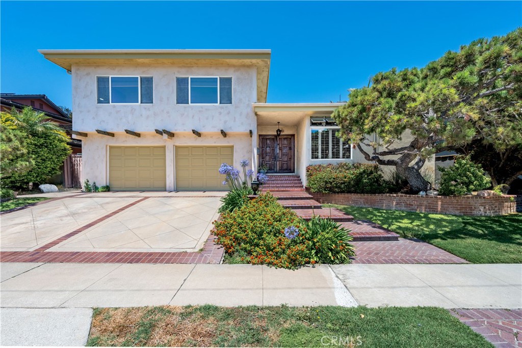Rare “Top of the Hill” Location with Direct Nature Access and Coastal Walkability
Situated in one of Seal Beach’s most exclusive enclaves, this stunning pool home offers rare direct access to Gum Grove Park—giving you immediate entry to serene walking trails and lush nature, by taking the stairs from from your backyard. Nestled on the desirable north side of Crestview Avenue, this home enjoys peaceful wetlands, and tranquil park scenery.
Inside, the open floor plan flows beautifully around a gourmet kitchen outfitted with top-tier Sub-Zero and Wolf appliances, a large granite island, and rich wood flooring throughout. The formal living room and step-down family room provide both elegance and comfort—perfect for everyday living or stylish entertaining. Upstairs is a primary bedroom suite featuring a walk-in closet and 3/4 bathroom and incredible views of the backyard and wetland and 3 other bedrooms and a full bathroom, all on the same level. What makes this house extra special is that it has solar power with paid-off solar panels, an Ecobee thermostat, a drip system for backyard plants and an Aqualink system for the pool.
Step outside to your own private retreat, complete with a sparkling pool, serene rock waterfall, hidden cave dive area, outdoor fireplace, multiple patios, an newer, oversized bar with built in BBQ and fridge, a pergola surrounded by professionally designed drought-tolerant landscaping and a unique large, old cactus that graces the backyard like a piece of art.
All this, just minutes by bike or foot to Old Town Seal Beach’s charming Main Street with its boutique shops and dining—and just a few more steps to the ocean and sand.
Located in the award-winning Los Alamitos School District (McGaugh Elementary School, McAuliffe and Oak Middle Schools & Los Alamitos High School), this is quintessential Southern California living—nature, elegance, and beach lifestyle all in one.
This is a must-see property in an unbeatable location.
