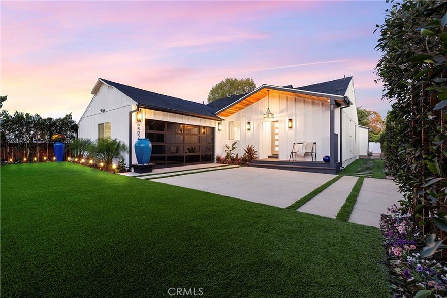Welcome to your private retreat in Sherman Oaks, a stunning 3-bedroom, 2.5-bath luxury home on a serene corner lot with 2,041 square feet of beautifully designed living space. Behind the gates, you’ll find an open floor plan filled with natural light, cathedral ceilings in the living room and primary suite, and elegant honey oak wood floors throughout.
The kitchen features custom cabinetry and high-end finishes that add warmth and sophistication. A large three-panel sliding glass door opens to a private backyard oasis with a sparkling pool, artificial turf, and a covered patio with a fireplace and TV—perfect for relaxing or entertaining friends and family.
The property also includes a spacious front yard with artificial turf, providing plenty of room for outdoor gatherings, kids’ play, or hosting lively summer parties.
This home is equipped with six surround sound speakers controlled by an iPad, recessed lighting throughout, and a finished garage with epoxy floors and built-in lighting, ideal for a gym, office, or game room. Surrounded by mature ficus trees that create total privacy, this home combines comfort, style, and smart design for effortless living.
Adding even more appeal, this home is located near Kester Avenue Elementary School, a highly regarded neighborhood school known for its excellent academic programs, dedicated teachers, and strong sense of community.