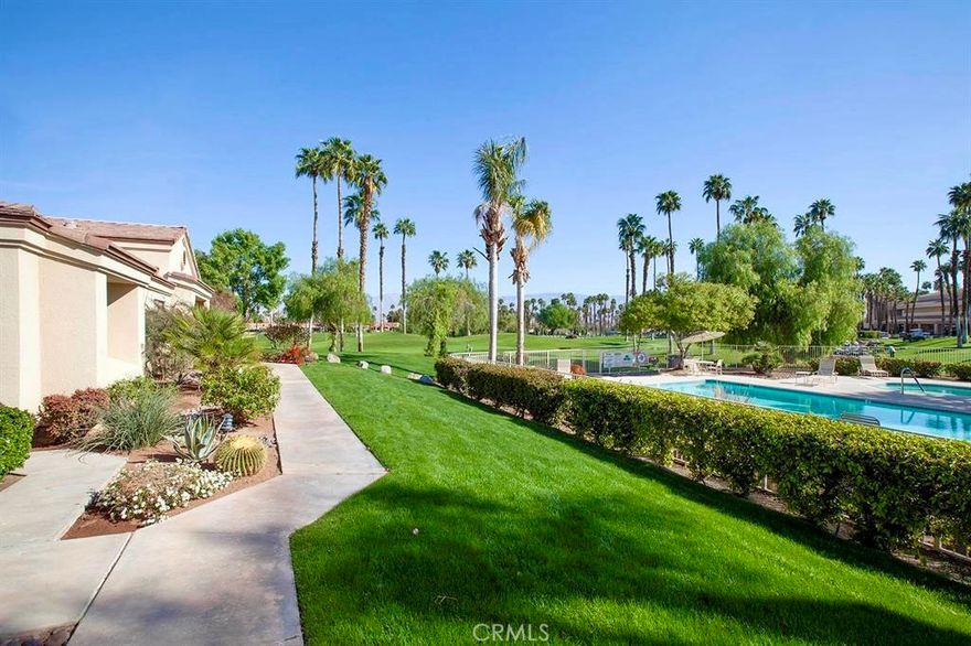 This is a fully furnished, all utilities paid, Seasonal Rental at the Palm Valley Country Club. Note that all furniture shown in the pictures will be upgraded in November 2025. Resort living at the Palm Valley Country club with 2 golf courses, tennis courts, pickleball, clubhouse, restaurants, shops, spa, and pools. This rare, end-unit, is 1900+ sf and a 3 BR/3BA (enlarged Cottonwood plan). The primary BR and 2nd BR are both en-suites. The 3rd BR could also be used as an office. The unit is privately situated at the end of the cul-de-sac. It is the closest unit to the clubhouse and in the middle of the community away from the main roads and RR tracks. It has a community semi-private pool and spa just outside the front door (see pics) giving the feeling that it is your own. Enjoy the golf course view of the first hole of the Championship golf course and mountain views in the background from the living room, dining room, kitchen, and one of the largest patios in the community.