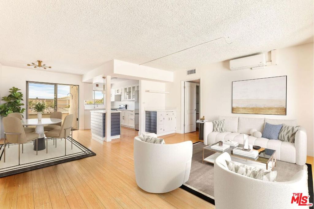 Located in the highly desirable 91206 zip code with a Walk Score rated as a "Walker's Paradise," this top-floor unit offers expansive views from every window and an abundance of natural light throughout the day. This updated two-bedroom, two-bathroom residence features a modern open-concept layout ideal for both comfortable living and entertaining. The kitchen has been upgraded with quartz countertops and comes equipped with stainless steel appliances, including a refrigerator, stove, dishwasher, and wine refrigerator. Step outside onto your private balcony to enjoy additional outdoor space and scenic views. The building offers a pool, outdoor common areas, and includes a designated parking space plus additional storage. The monthly HOA fee conveniently covers all utilities except Wi-Fi and cable. Ideally located within walking distance to Whole Foods, the upcoming Erewhon, the Americana, and many local eateries and coffee shops.