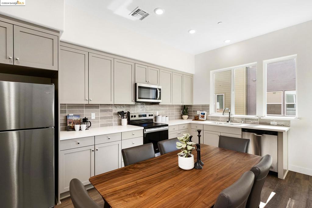 Brand New Corner location, 1,808 square foot townhome style, 3 bedroom, 3 full bath beautiful home. The home boasts beautiful interior finishes with an open concept family room and kitchen and an additional den space. All electric appliances included. Private 2-Car side-by-side Garage with a pre-wire car charger and interior access. Highly desirable community with a beautiful hillside backdrop, overlook park and dog park with a public walking trail within the community. Great location! Short walk to BART. Easy access to 880 and 580. Close by shopping and restaurants. This home is located at SoMi HayPark, Hayward, CA 94544. This is our popular Plan 4.