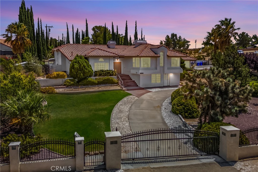 ****Desert Knolls Beauty with RV Parking, Pool & Views!****
Welcome to this stunning 4-bedroom, 4-bath home perfectly situated on a corner lot in the highly desirable Desert Knolls area of Apple Valley***Offering breathtaking panoramic views, this property can be many things, but it is sure to offer plenty of room for entertainment, relaxation or tranquility***
***Enjoy the sparkling heated pool powered by solar, a built-in BBQ with an outdoor kitchen area, fire pit, bathroom/small pool house and a large fully fenced yard with plenty of space for gatherings, offering privacy & security**
***Inside, you’ll find two cozy fireplaces, spacious living areas, with large pictures windows and AMAZING VIEWS of the valley & Mountains***There is an additional living quarters downstairs—ideal for guests or multi-generational living, equipped with a full living room, bedroom, bathroom and private entrance***
***The RV access & 3-car garage make parking easy and offers tons of room for your toys, while the expansive lot provides privacy and room to spread out**With modern amenities, a large corner lot, and gorgeous views you’ll never tire of, this home is a true Apple Valley gem, a rare opportunity to own a home where luxury & lifestyle meet in one of Appel Valley's prestigious neighborhoods***