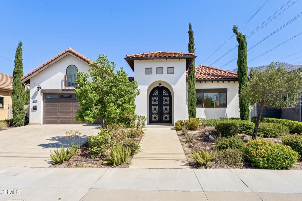 Nestled in the heart of East Pasadena, this delightful Mediterranean-style home effortlessly combines comfort with elegance. With 2,360 square feet of living space, this residence showcases three generous bedrooms and three bathrooms, offering plenty of space for entertaining guests or unwinding in style.The open-concept design ensures a seamless flow between the kitchen and family room, enhanced by a sliding glass door that opens to the backyard, creating a harmonious indoor-outdoor living experience. The kitchen is a chef's delight, fitted with stainless steel appliances, including a gas range and hood, refrigerator, microwave drawer, and a discreetly paneled dishwasher. The spacious kitchen island serves as a versatile hub, perfect for meal prep, casual dining, or a breakfast bar. For more formal occasions, the separate dining room provides the ideal setting for gatherings.Retreat to the expansive master bedroom, featuring his and hers closets and a luxurious en-suite bathroom. The master bath offers a separate shower and tub, dual sinks, and a large vanity area with plenty of storage.The beautifully landscaped backyard, with its lush lawn and shaded by mature trees, is a tranquil oasis. Additionally, enjoy the home's interior courtyard, complete with a cozy fireplace, space for a TV, and a wet bar area with an outdoor refrigerator, perfect for relaxation and entertainment.Additional features include a convenient laundry room and a two-car garage, adding to the practicality and appeal of this delightful home.