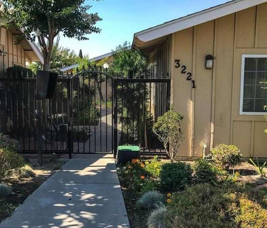 Move in ready in the spacious open floor plan 2 bedroom 1 bath with central air conditioning and heat.  Back patio, gated access, community pool and community laundry.  1 designated parking spot.  Conveniently located near freeway access and shopping. Tenants pay electric and gas. This is for Unit #3.