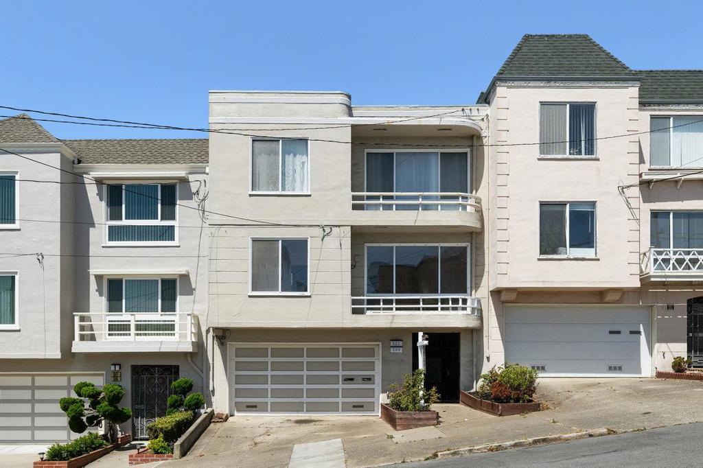 Welcome to 509-511 44th Avenue, a well-maintained duplex just blocks from Ocean Beach and Lands End in San Francisco's sought-after Outer Richmond neighborhood. This charming property features two spacious, light-filled units with a tunnel entrance to two separate units - ideal for owner-occupants, multigenerational families, or savvy investors. Both units are identical, each offering 1,300 square feet of living spaces, boasting 2 large bedrooms, 1 full bathroom with shower and tub, a generous living room and formal dining area perfect for relaxing and entertaining. Each unit also includes a sizable kitchen with ample cabinet and counter space, designed for everyday living. A spacious two-car garage with room for storage and laundry, along with a low-maintenance backyard ready for gardening, pets and play, completes this rare gem. Nestled on a quiet street, just steps to Lands End Trail, Ocean Beach, Sutro Heights, Lincoln Park and Golf, this duplex is also just a short stroll from local cafes, transit, and highly rated schools. Whether you live in one unit and rent the other, host extended family, or invest in a prime coastal property, this home offers flexibility, charm, and an unbeatable San Francisco location.